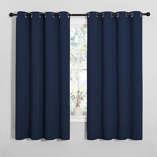 NICETOWN Blackout Draperies Curtains, All Season Thermal Insulated Solid Grommet Top Blackout Curtains/Drapes for Kid's Room (Navy, 1 Pair, 55 x 68 inches)