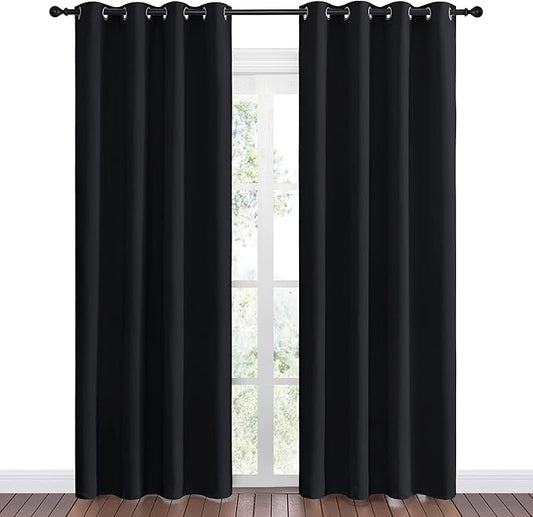 NICETOWN Halloween Blackout Curtain Panels 86 inches - Light Reducing Thermal Insulated Solid Grommet Blackout Curtains/Panels/Drapes for Living Room (Set of 2, 55 inches by 86 Inch, Black)