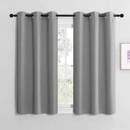 NICETOWN Thermal Insulated Grommet Blackout Curtains, Kids Window Drape Panel for Nursery, Privacy Short Curtains (Silver Grey, 2 Panels, W42 x L50 -Inch)