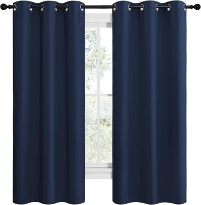 NICETOWN Blackout Draperies Curtains, All Season Thermal Insulated Solid Grommet Top Blackout Curtains/Drapes for Kid's Room (Navy, 1 Pair, 42 x 68 inches)