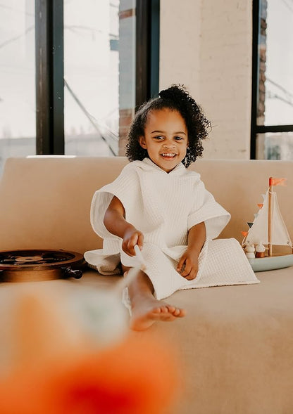 Hooded Towel for Babies + Toddlers | Snaps into a Poncho | Organic Cotton Waffle | Lighweight and Absorbent | Bath, Beach, and Pool | Multiple Colors (Small (0-3 Yrs), Lily White)