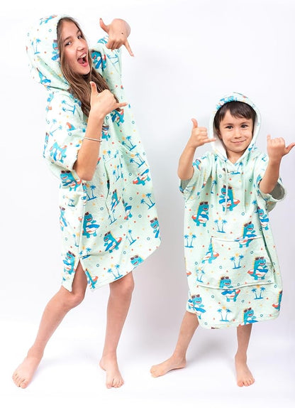 Cotton/Microfiber Kids Surf Poncho, Wetsuit Changing Towel Bath Robe with Hood and Pocket for Ages 3-7 and 8-12 (Surfer Dinos, 8-12 Years)
